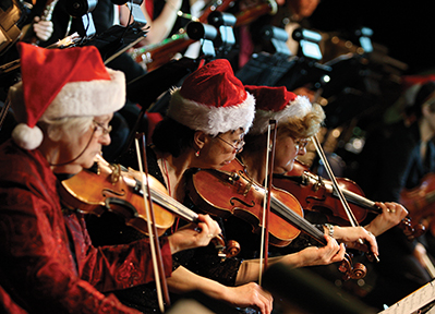 The 3 violinists are Pat Blackie, Linda Nystrom and Janina Romiszewski